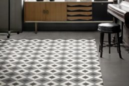 tappeto con cementine decorate quadrate a rombo